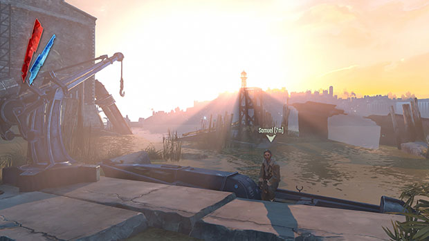 A sunset shines through the harbor.