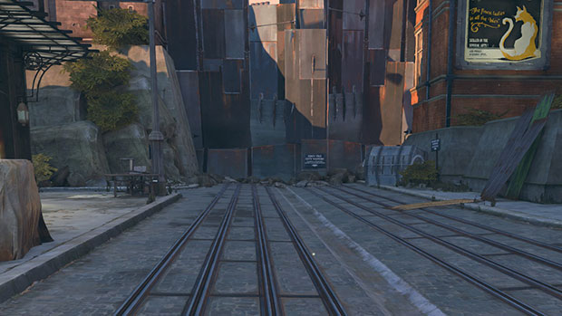 Two sets of tracks run into the distance, each with four rails. They end at what looks like a Half-Life 2 Combine wall.