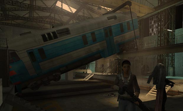 There are two locomotives in there, one of which used to hang from some kind of crane, but has partly fallen down since, so it hangs there at an odd angle.