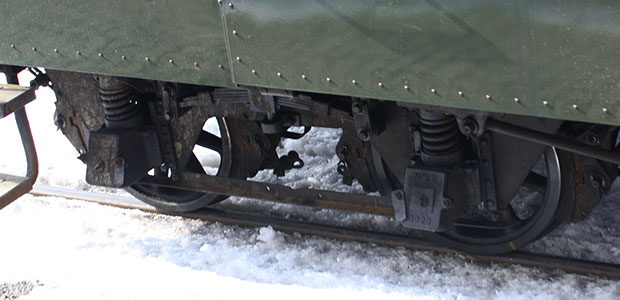 There, passenger cars ride on trucks that look similar, but are probably more complicated designs.