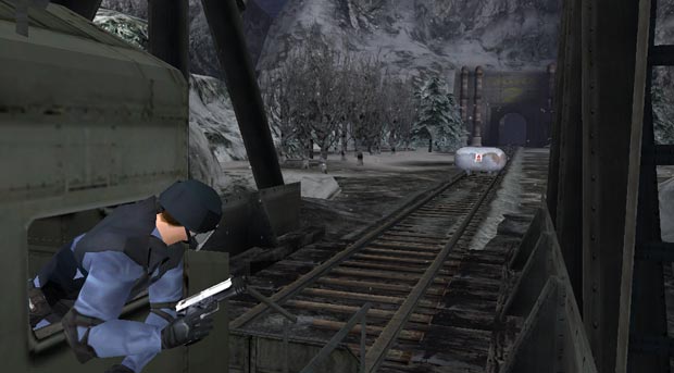 The gas tank is right on the rails, exactly orthogonal to them.